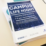 Stack of Campus Life Night posters